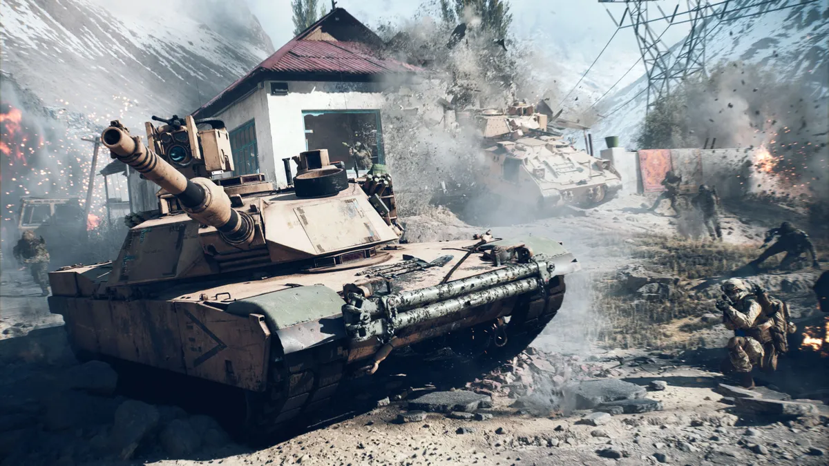 A Battlefield 6 tank breaking through a wall while infantry move through the debris